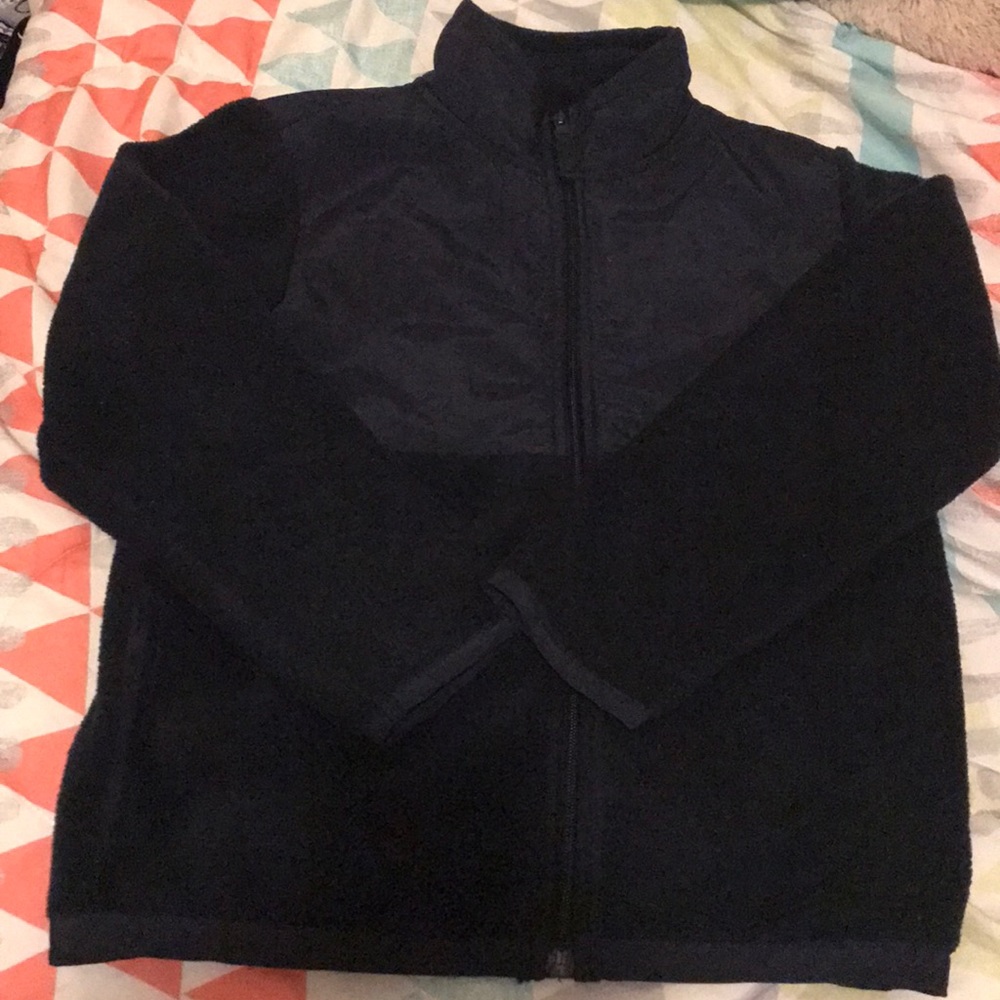 Boys full zip fleece jacket with two pockets.